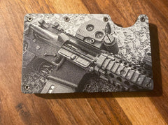 Wallet - AR15 closeup w/ Holographic Optic on Rocky Background